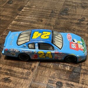 DuPont 24 Blue Racing Car Toy with Snoopy. Metal with small dent on hood.